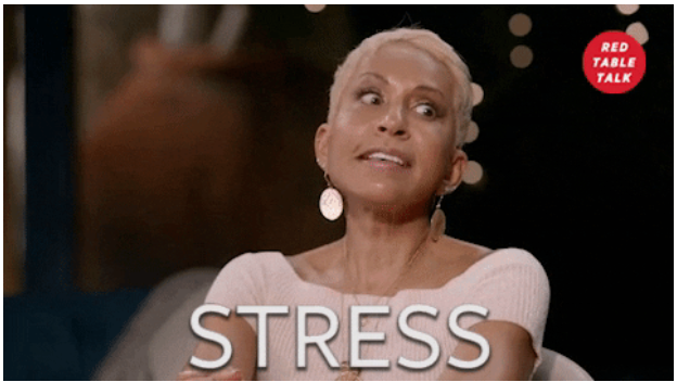 A woman with short blonde hair and large earrings sits with a tense expression. The word STRESS is overlaid, hinting at the pressures faced in civil engineering. The Red Table Talk logo appears in the corner.